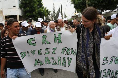 Click on image to see full-sized version CRH placards lead the demo