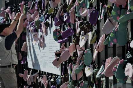 Click on image to see full-sized version Shoes representing the victims and survivors of abuse