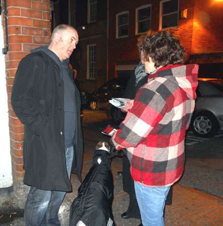 Click on image to see full-sized version Two of the protesters talk to Dara