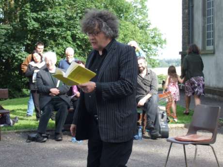 Click on image to see full-sized version Paul Muldoon reading