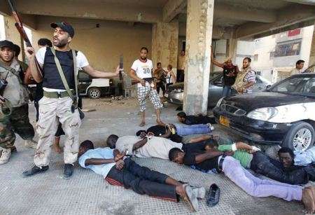NATO backed mercenaries grabbing any 'Black Fella' they can find