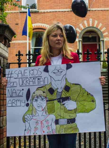 Click on image to see full-sized version This was by far the best poster at today's demo, hand drawn by the lady in the photographs' young daughter.