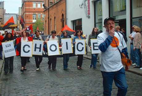 Click on image to see full-sized version Alan (right) leading a small pro-choice march in 2002