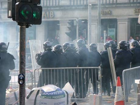 Click on image to see full-sized version Fireworks Explode All Around Police Lines