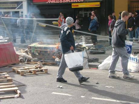 Click on image to see full-sized version Bizzarely Shopping Continues Through the Riots