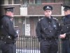 Gardai at the door of the Wheelock home, as usual.