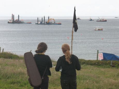 Click on image to see full-sized version The dredgers and support ships from the camp Sunday morning