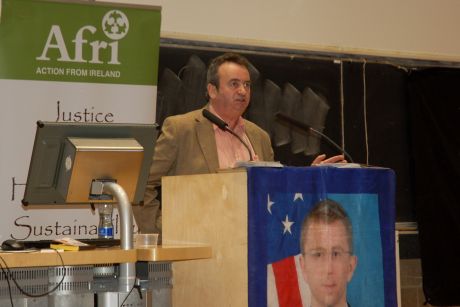 Click on image to see full-sized version Gerry addresses the Trinity meeting