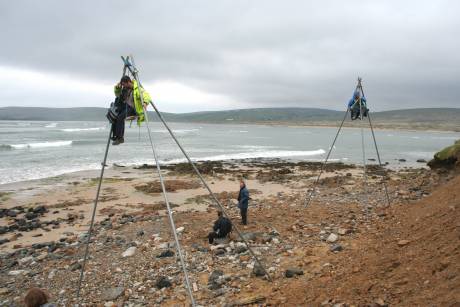 Click on image to see full-sized version Tripods on the shoreline