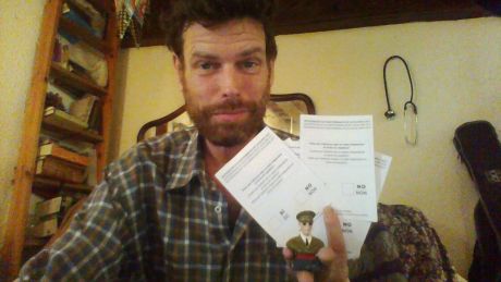 Click on image to see full-sized version over 9 million ballot papers have been seized by Spanish police often with scant legality. Here I hold a handful. like many I distribute